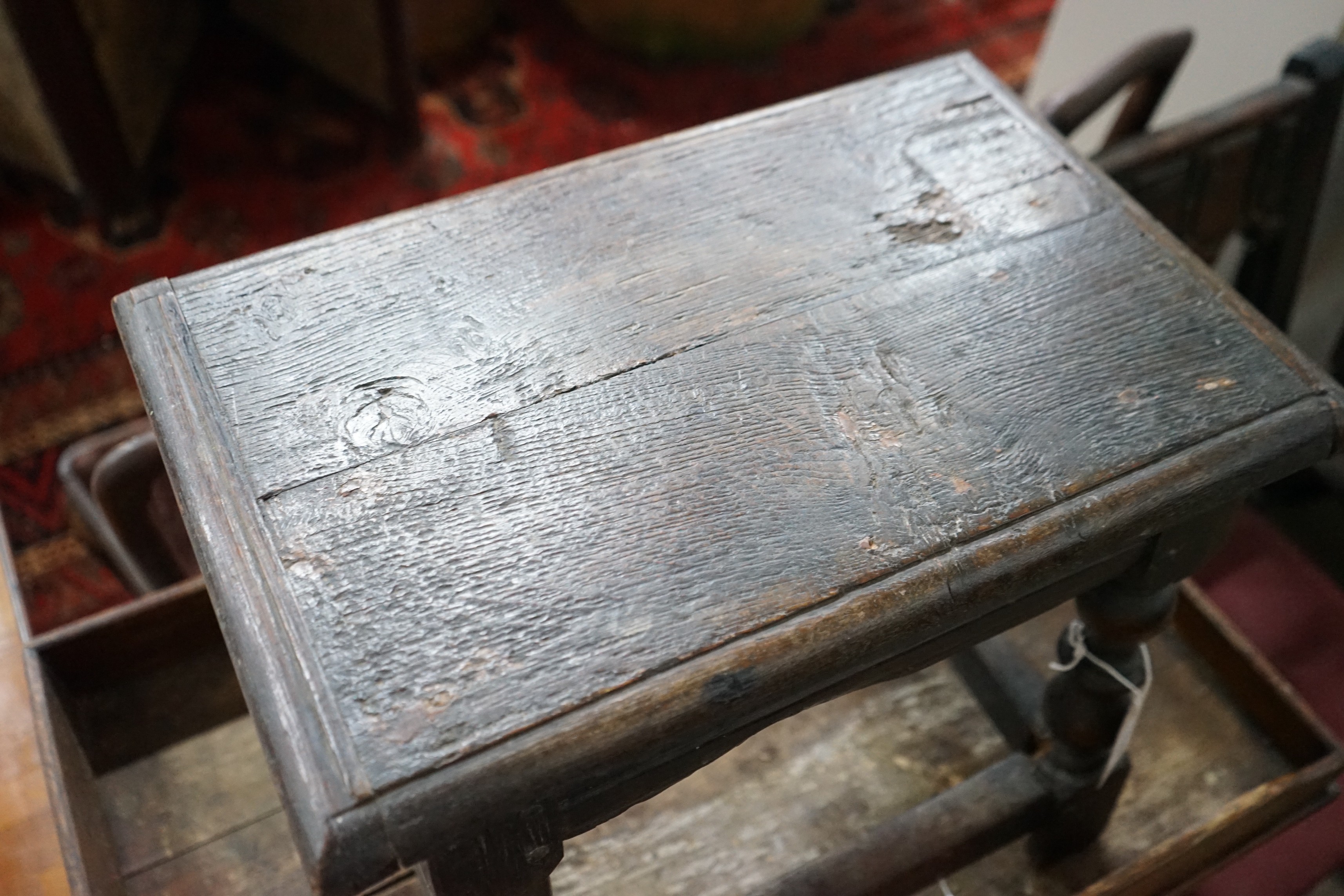 An early 18th century style oak joint stool, width 46cm, depth 30cm, height 38cm and a Victorian butler's tray on stand
